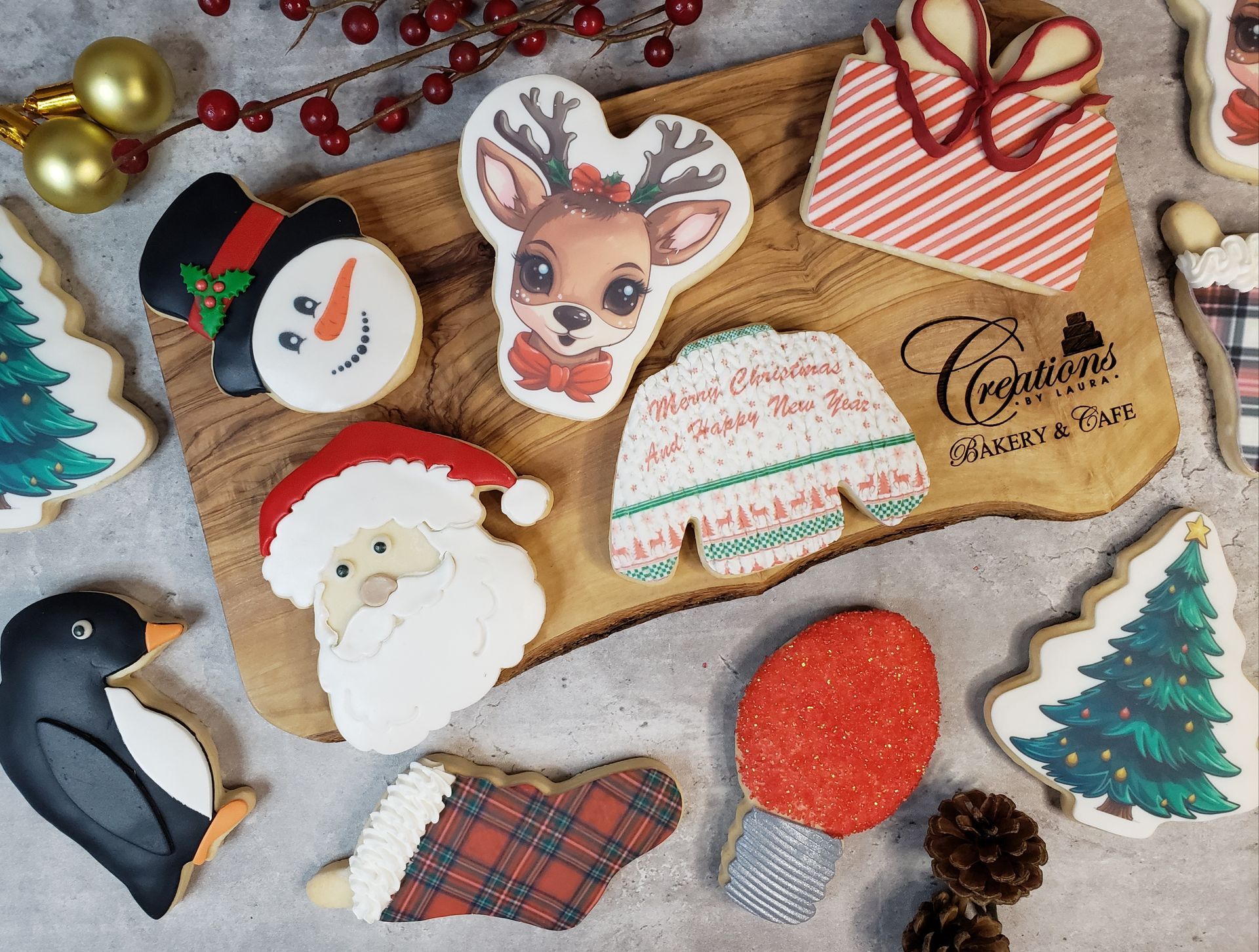 a wooden cutting board with christmas cookies on it
