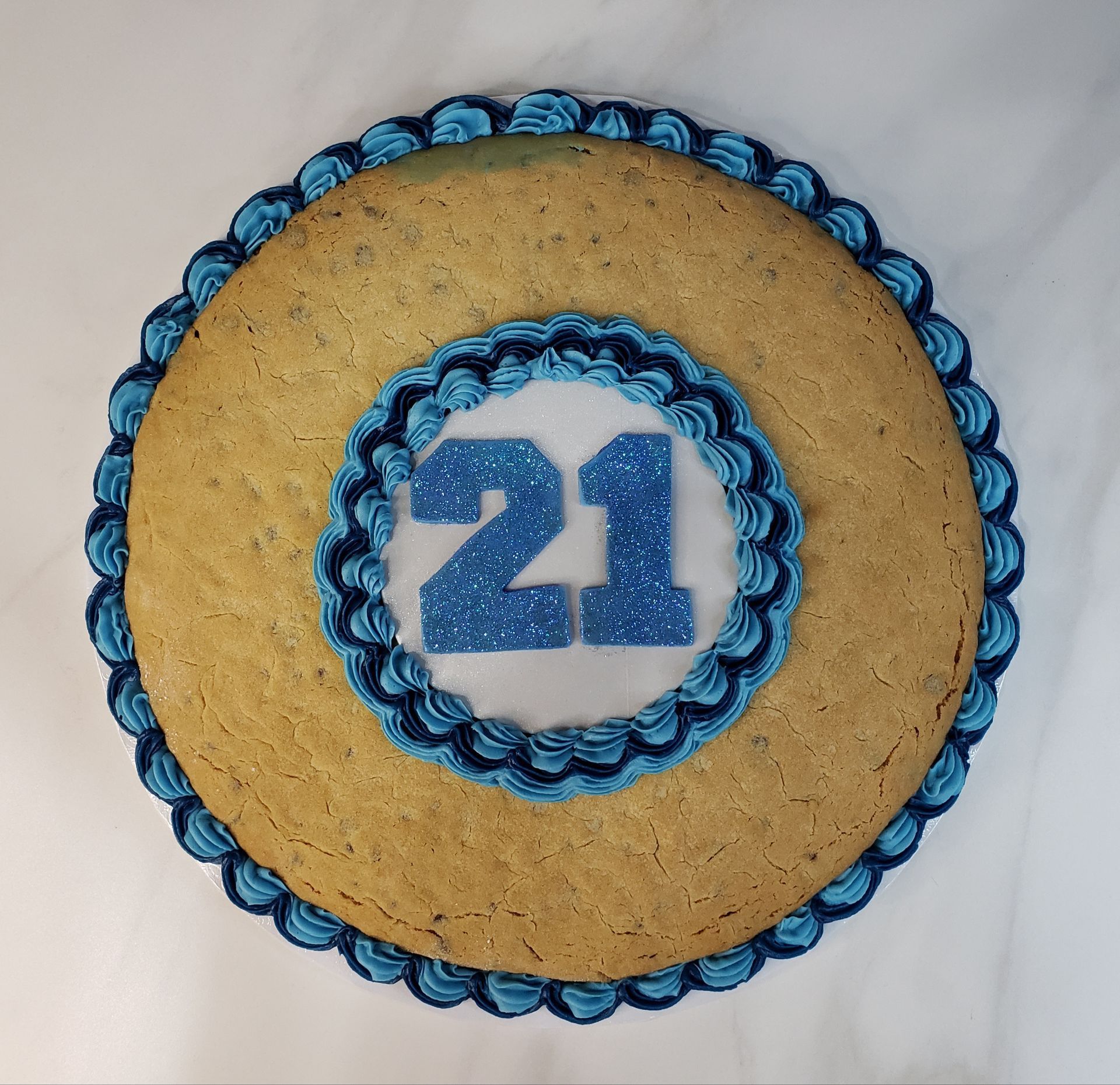 A cake with the number 21 on it