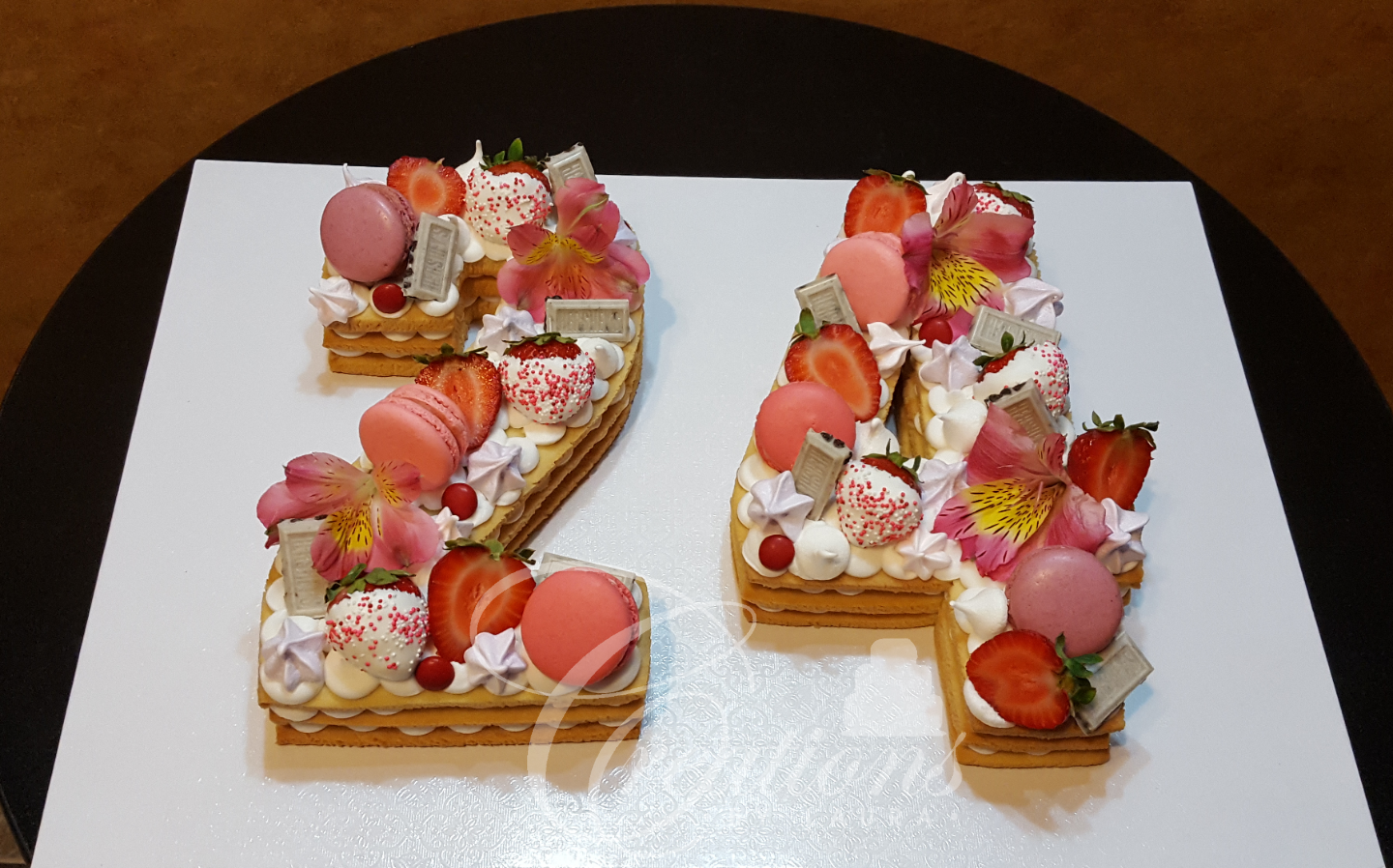 A cake in the shape of the number 24