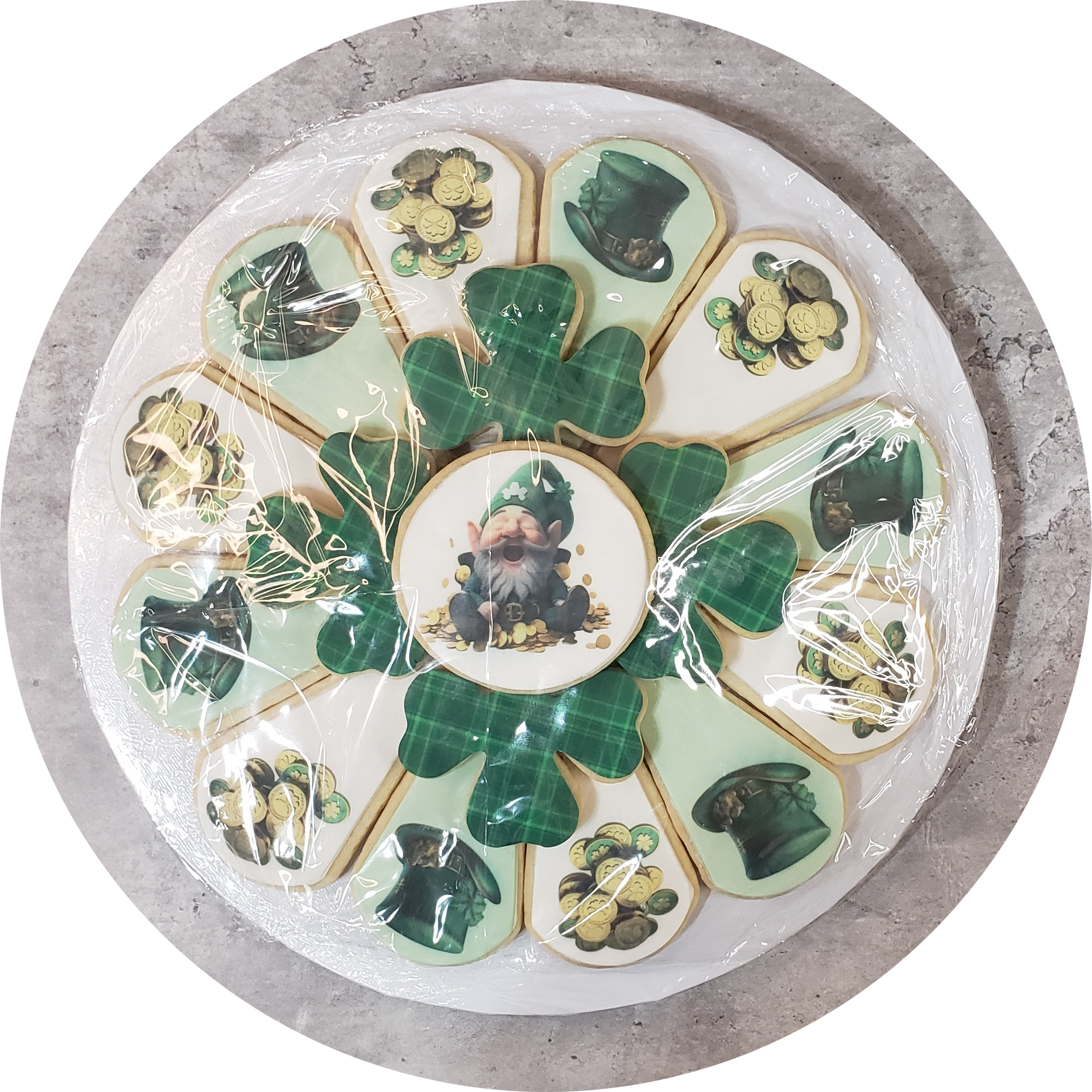 A plate of cookies with a leprechaun on it