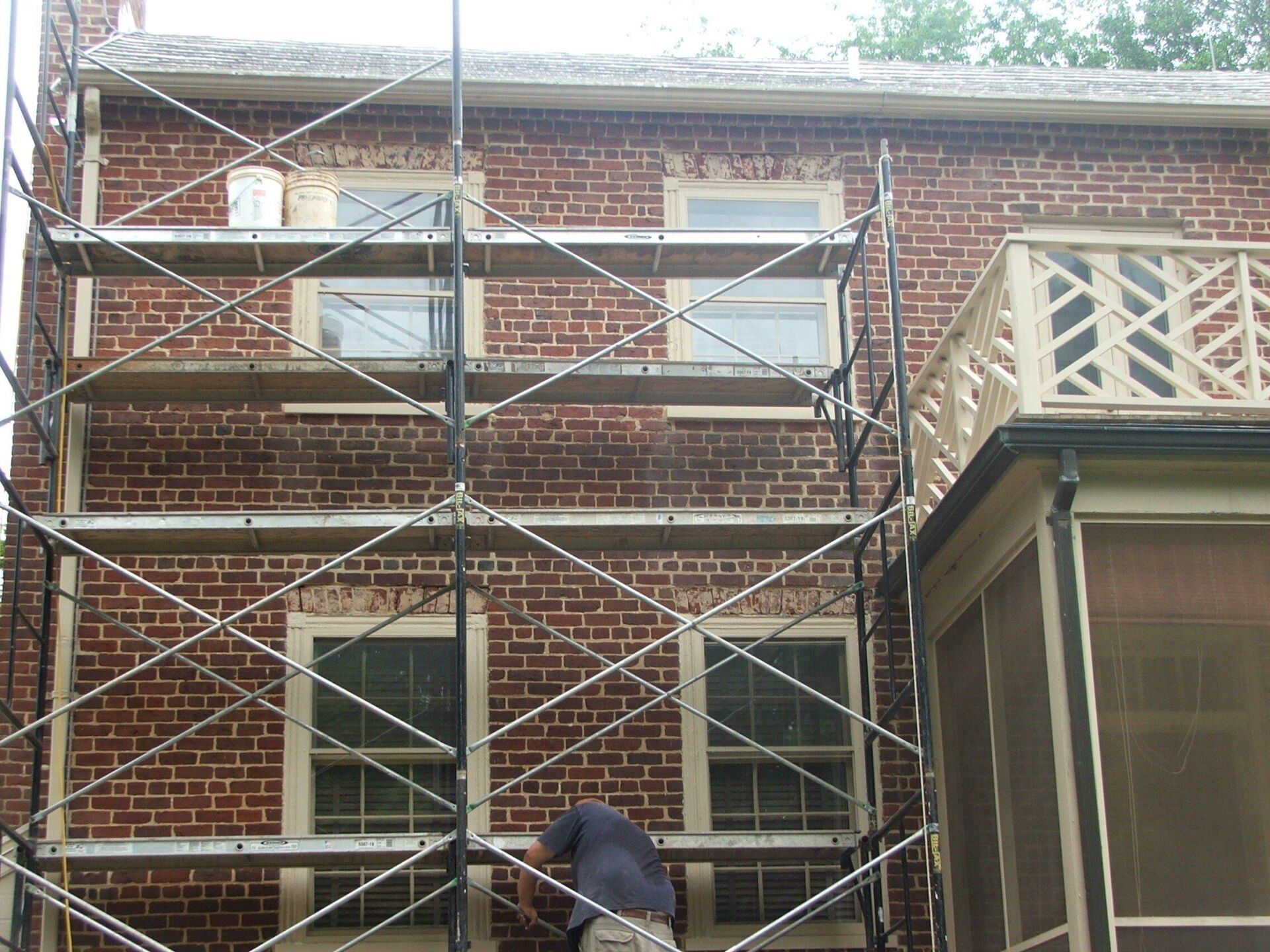 Man doing old building restoration work