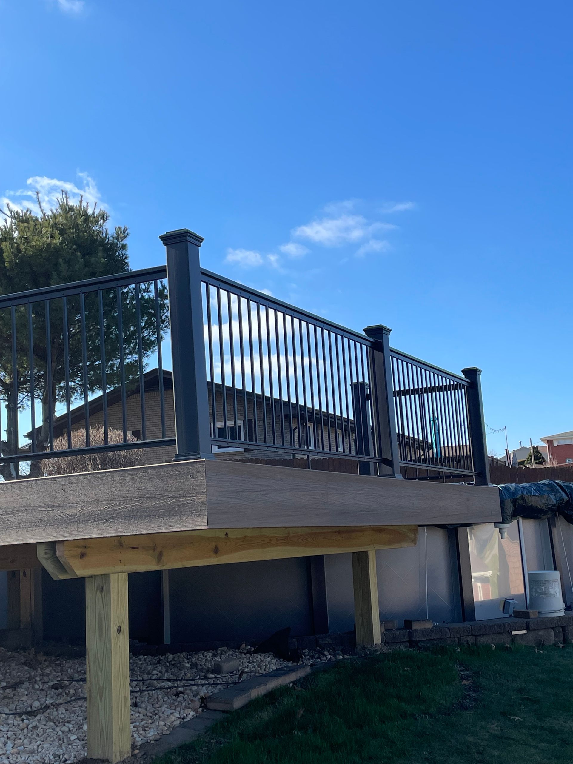 Custom deck construction with railing services