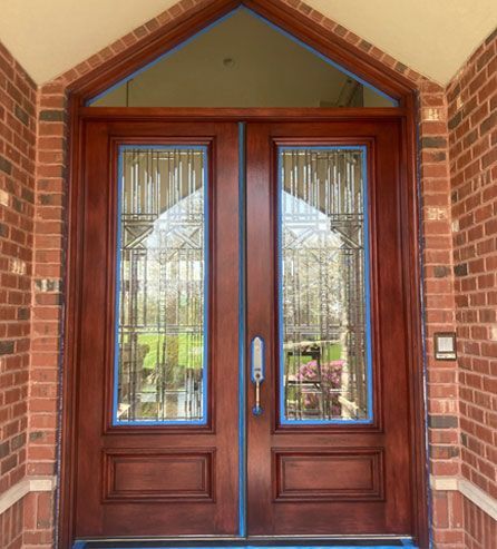a brick building with a wooden door 