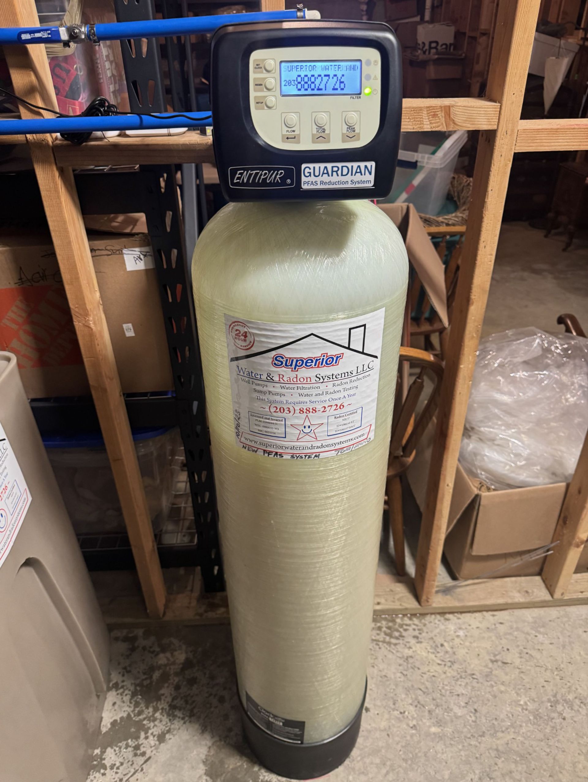 Water softener system with digital display, indoors.