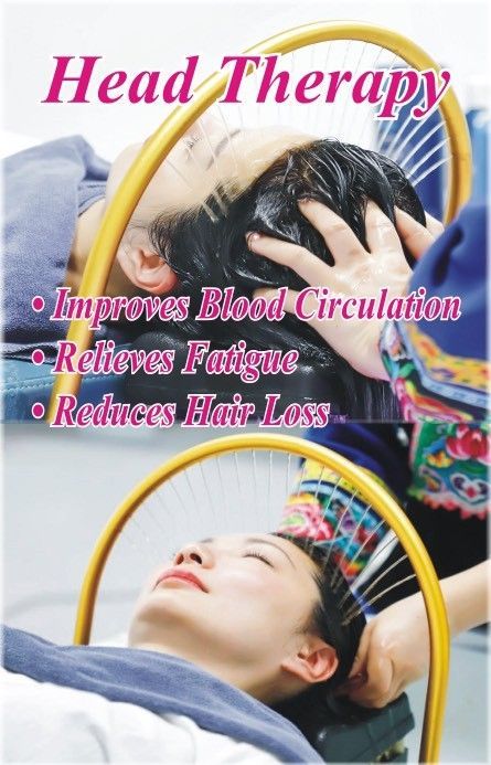 A picture of a woman getting a head therapy