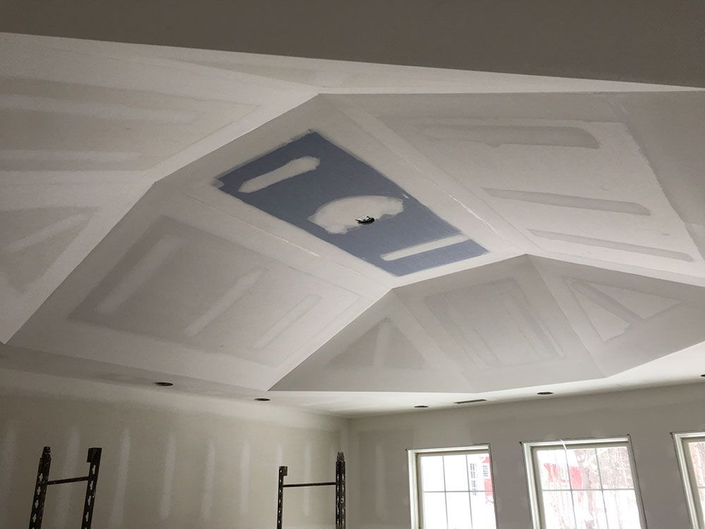 A room with a ceiling that is being remodeled