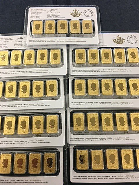 A bunch of gold bars stacked on top of each other