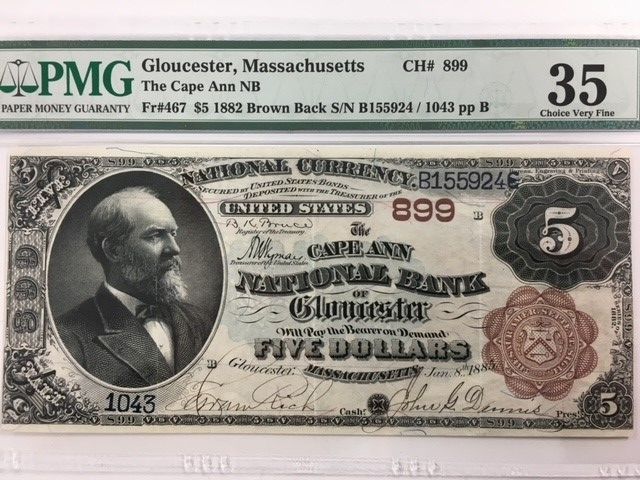 A five dollar bill with a picture of a man on it