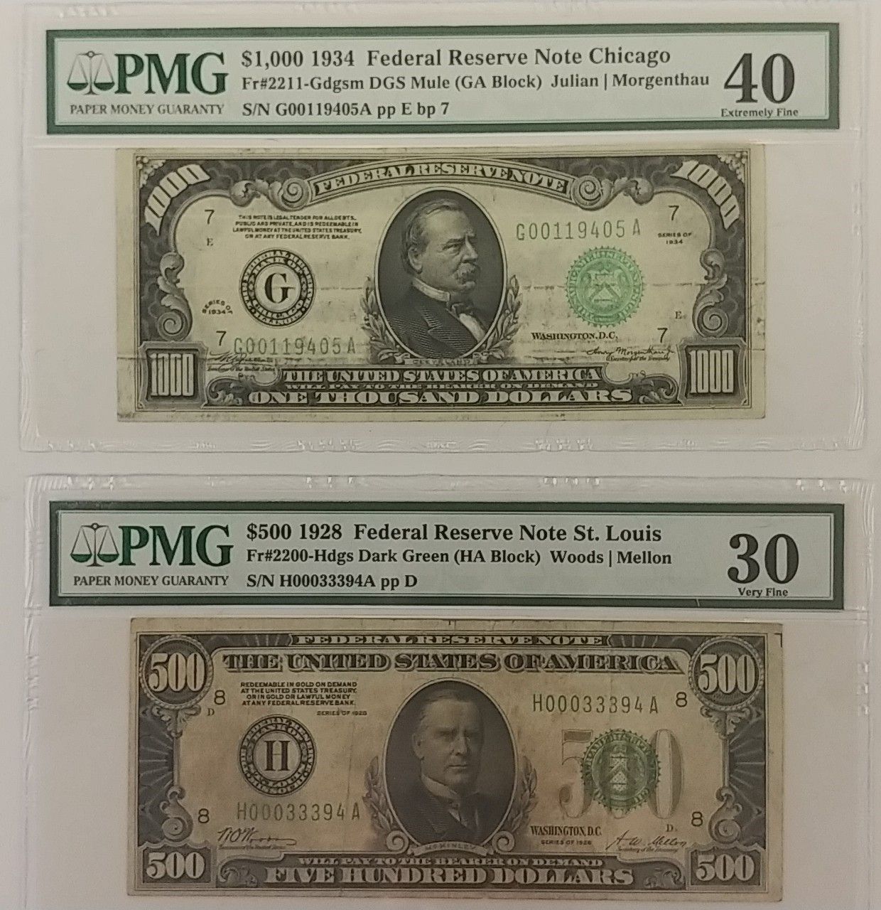 Three us dollar bills are displayed on a white surface