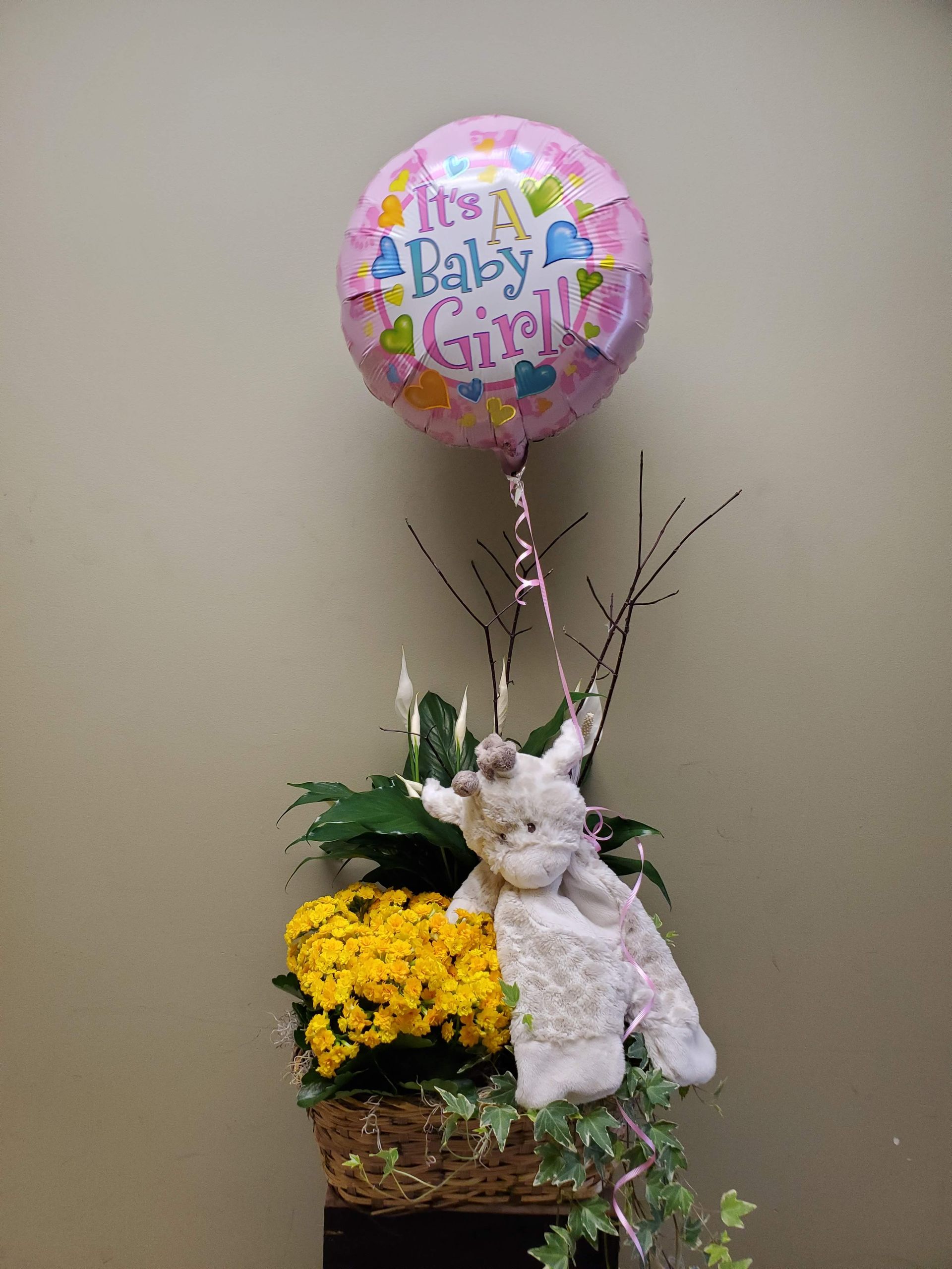 A vase filled with flowers is sitting on a table.