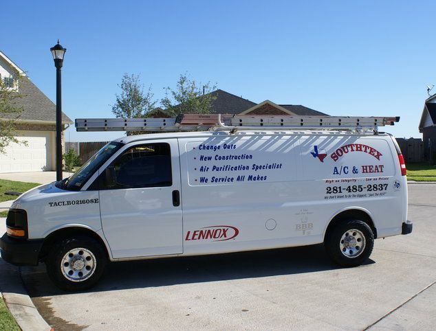 A white van with the word lennox on it