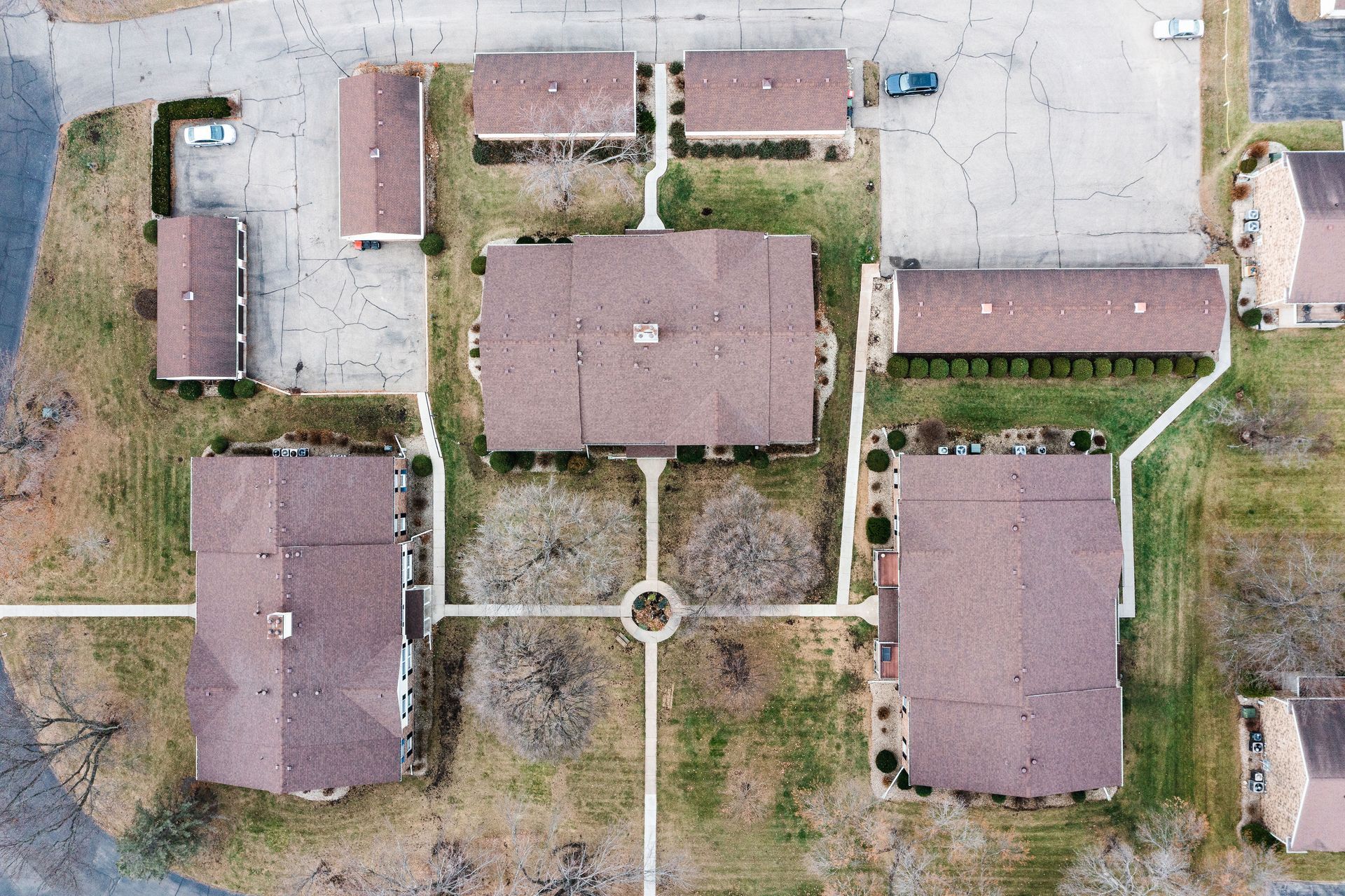 An aerial view of a residential area with lots of buildings