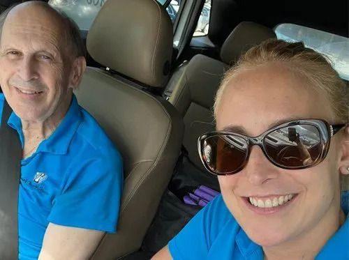 Joanie and father on the job