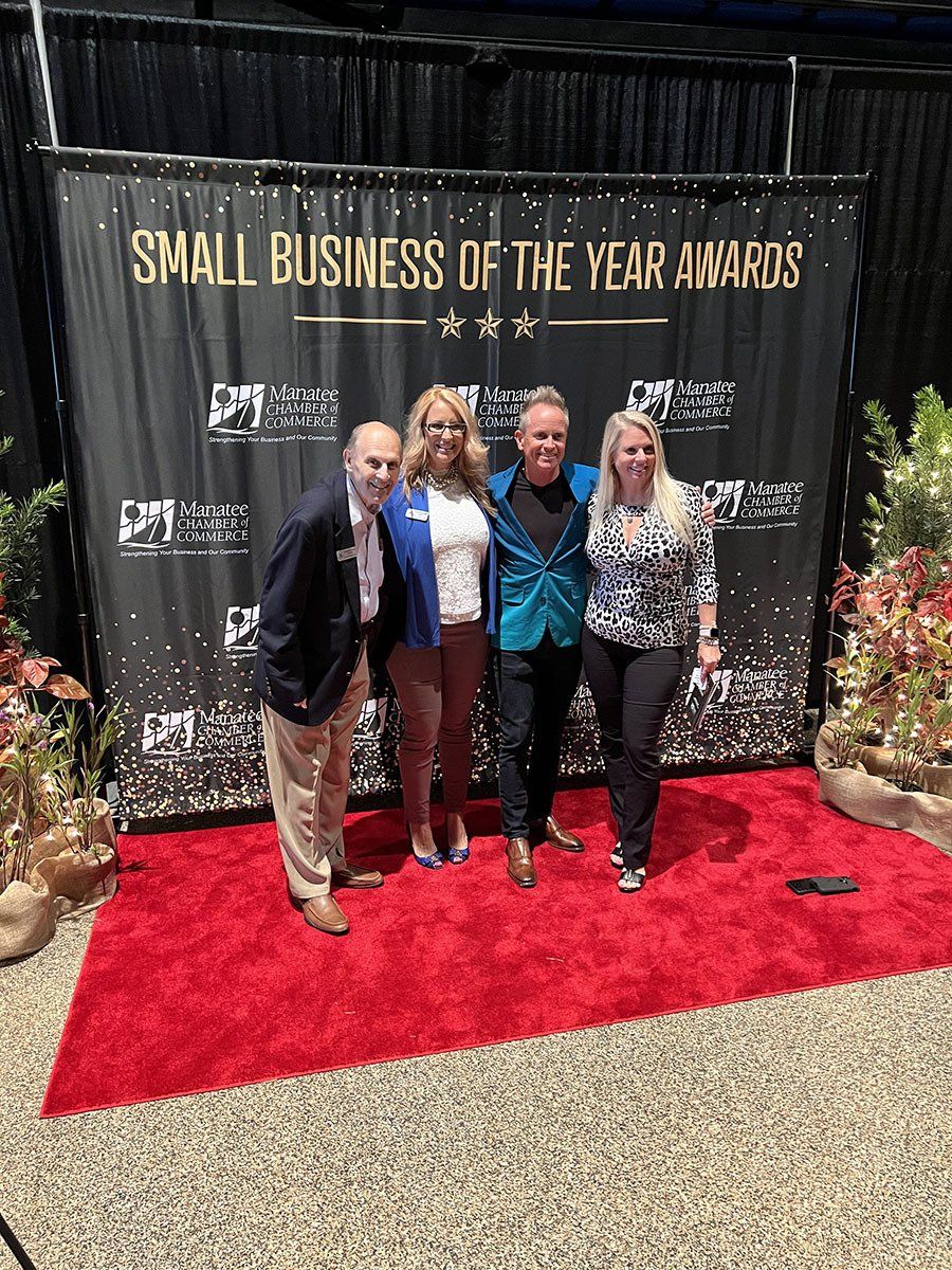 A group of people at an awarding ceremony