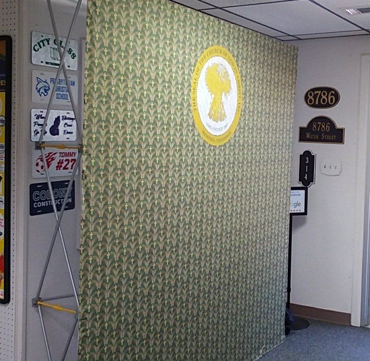 A wall with a keyhole and the number 8786 on it