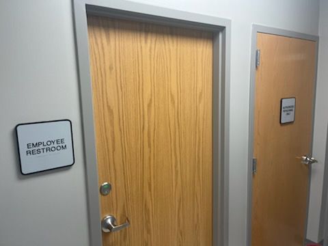There is a sign on the door that says employee restroom.
