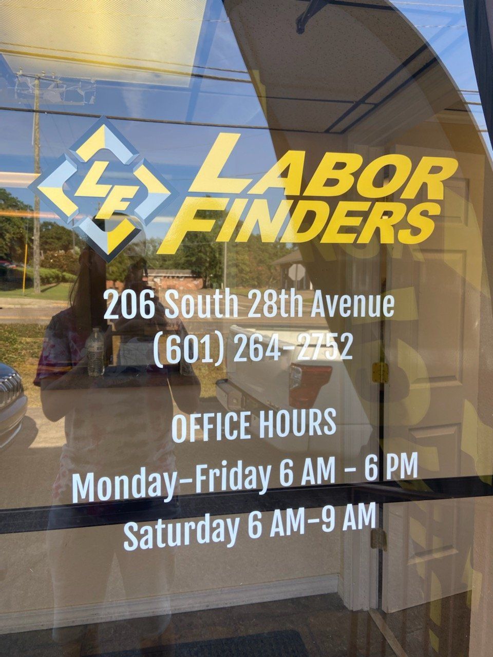 A sign for labor finders on 206 south 28th avenue