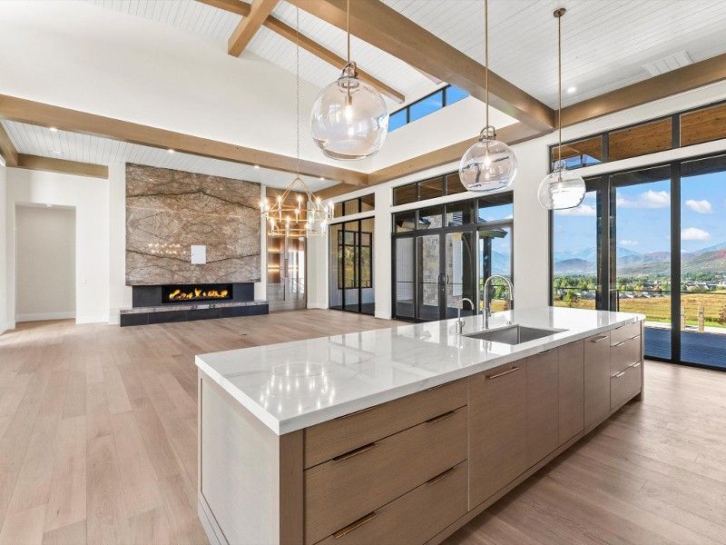 There is a large island in the middle of the kitchen.