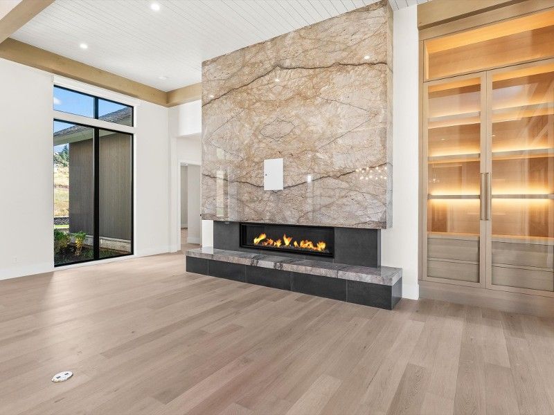 There is a fireplace in the middle of the room.