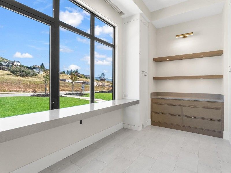 There is a large window in the middle of the room.