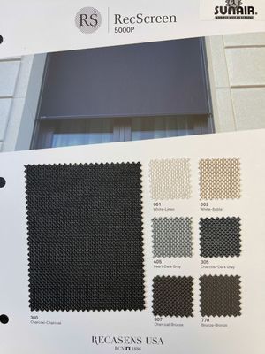 Fabric sample card showing RecScreen 5000F fabric options, colors include charcoal, white, and various shades of gray.