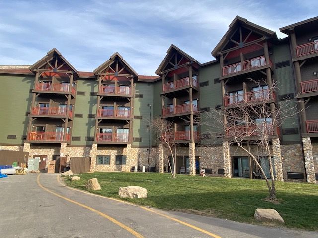 A large apartment building with a lot of balconies