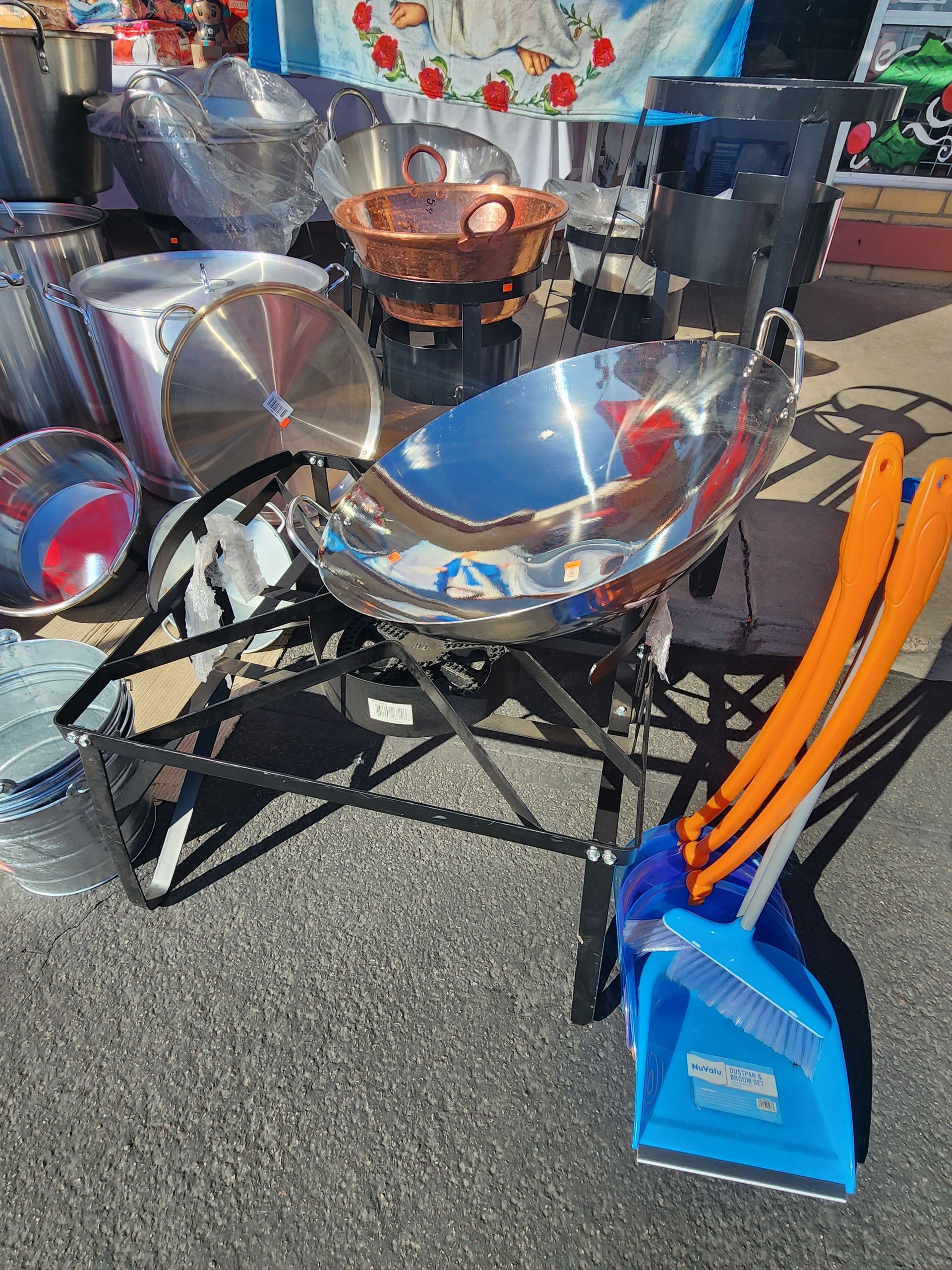a variety of pots and pans are sitting on a table .