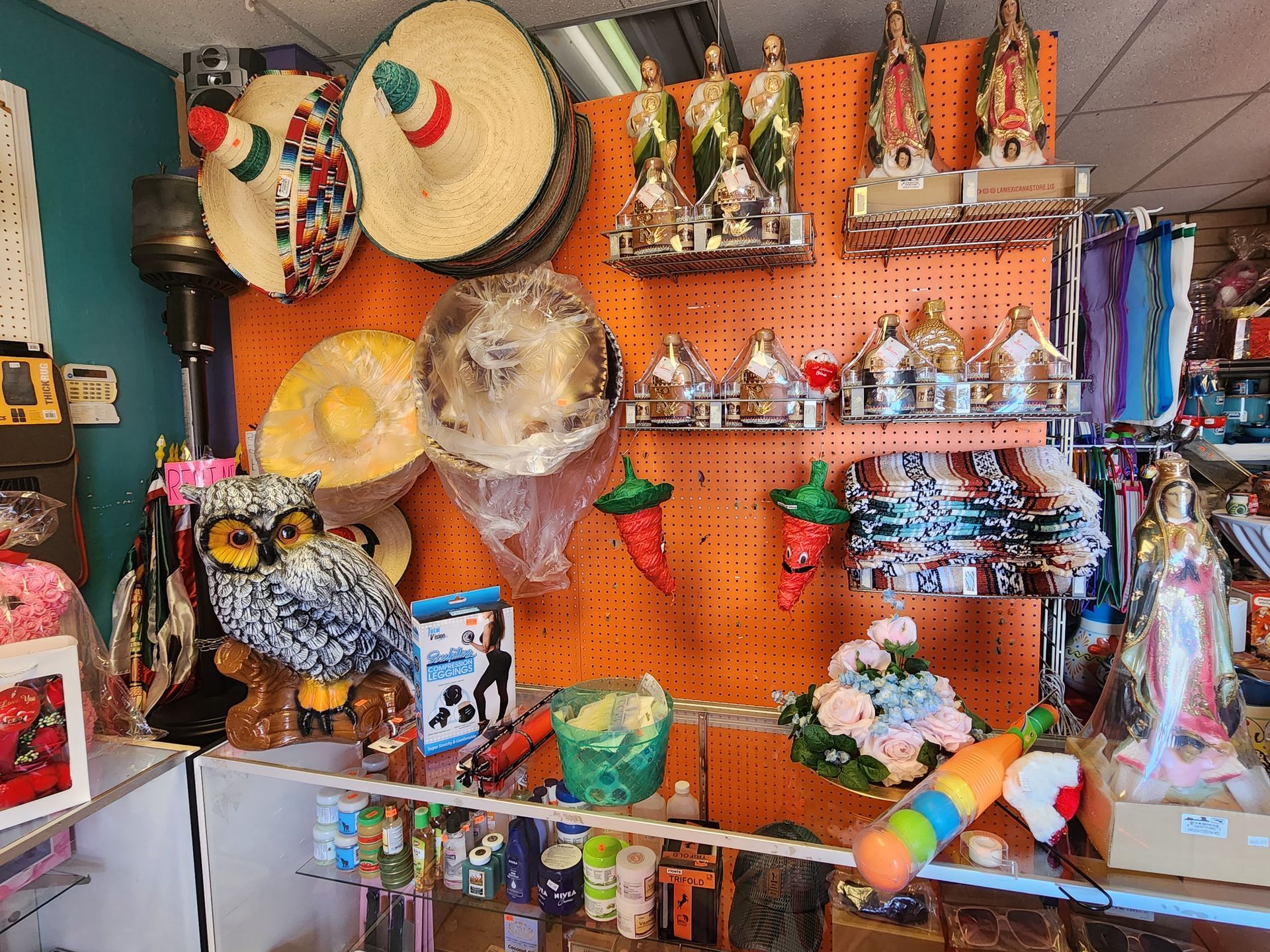 a store filled with lots of toys and hats .