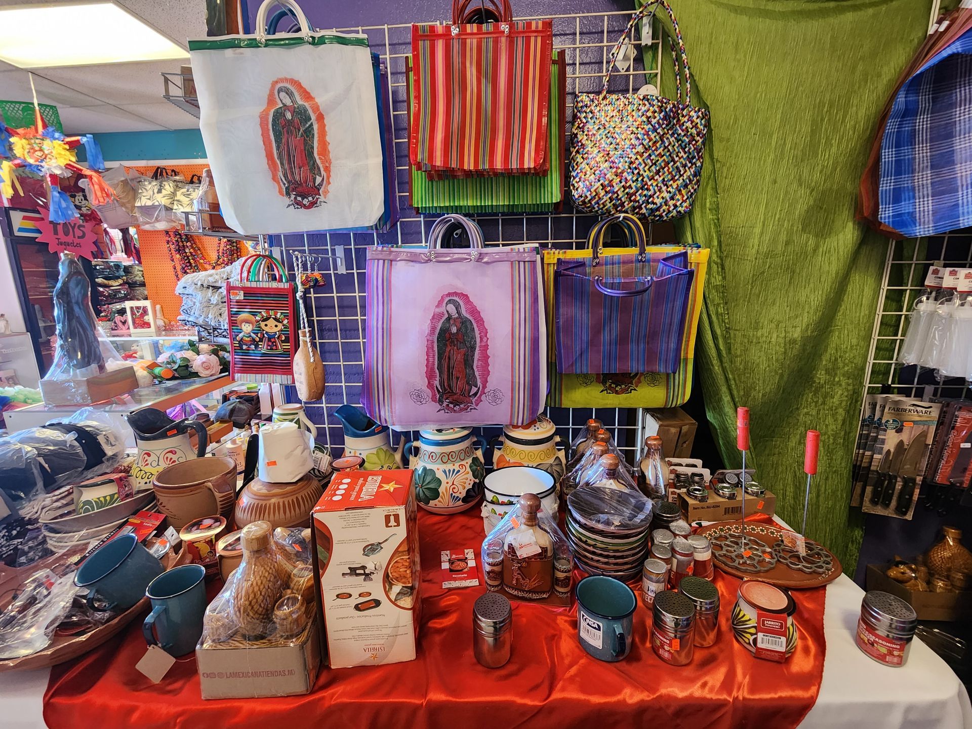 a table with a lot of items on it in a store