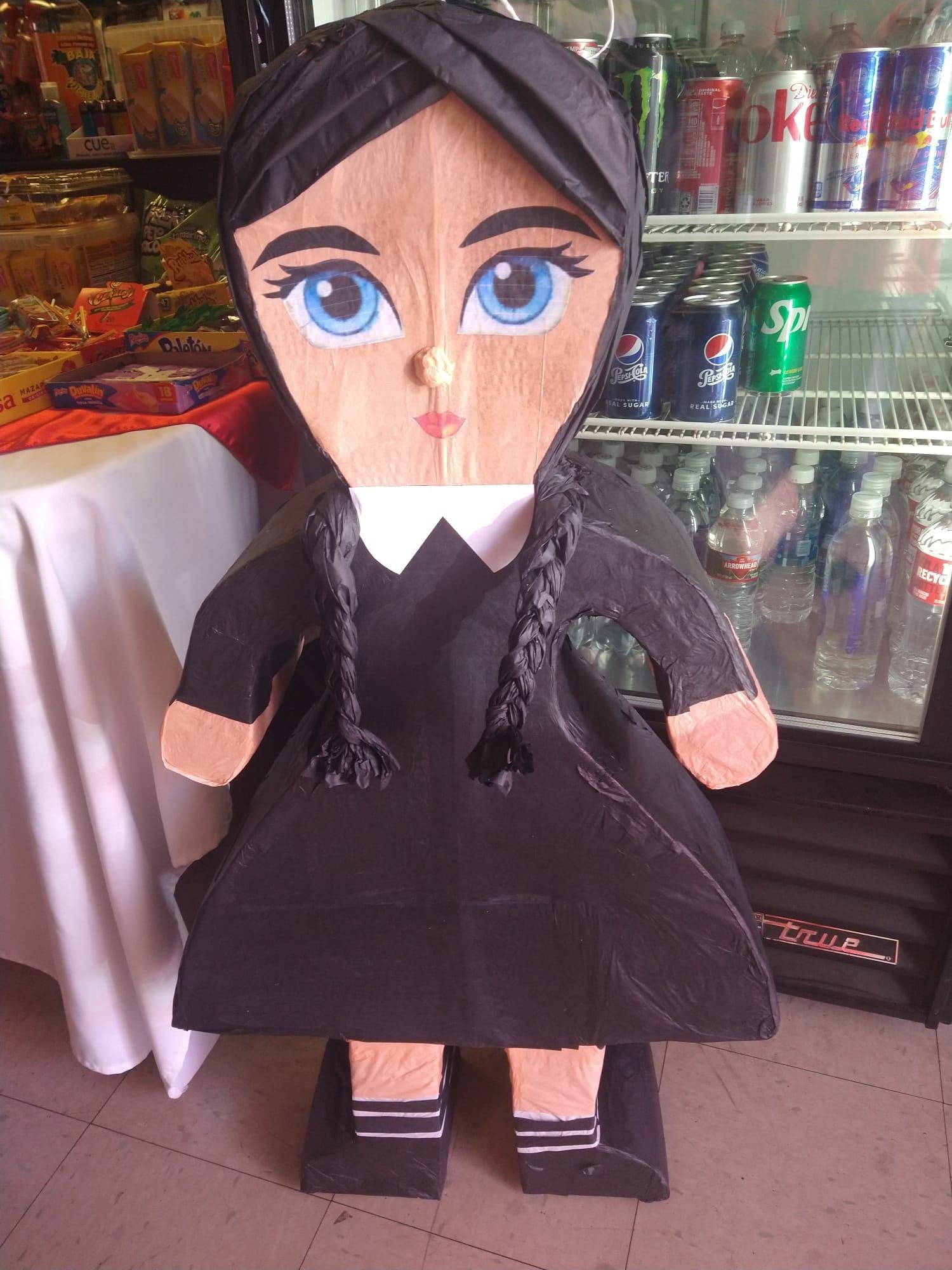 a wednesday addams pinata