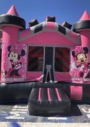a pink and black bouncy house with minnie mouse on it 