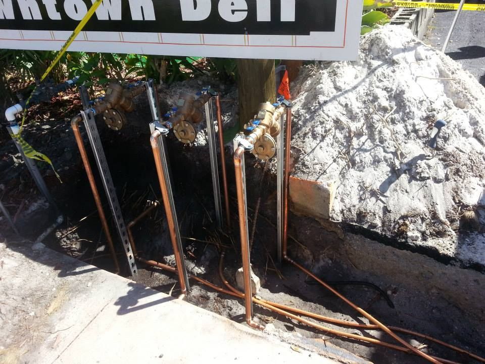 A construction site with a sign that says downtown deli