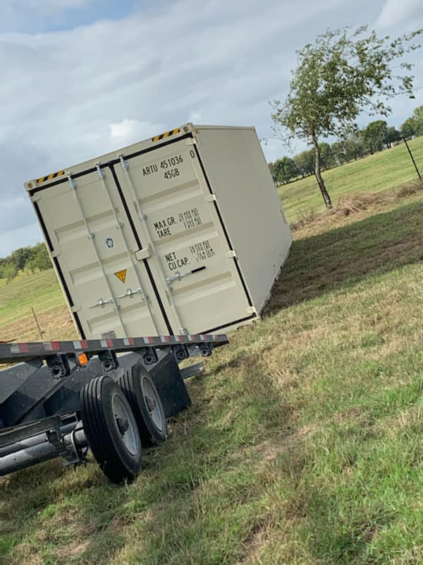 Unloading shipping container