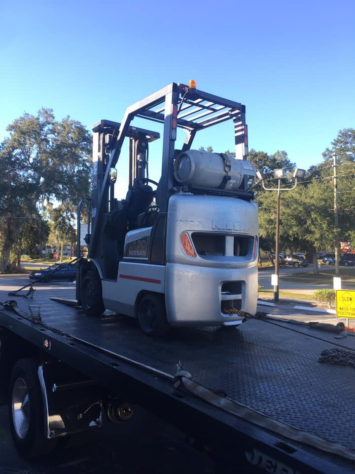 forklift on a truck