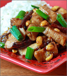 Pork dish with green onions and rice