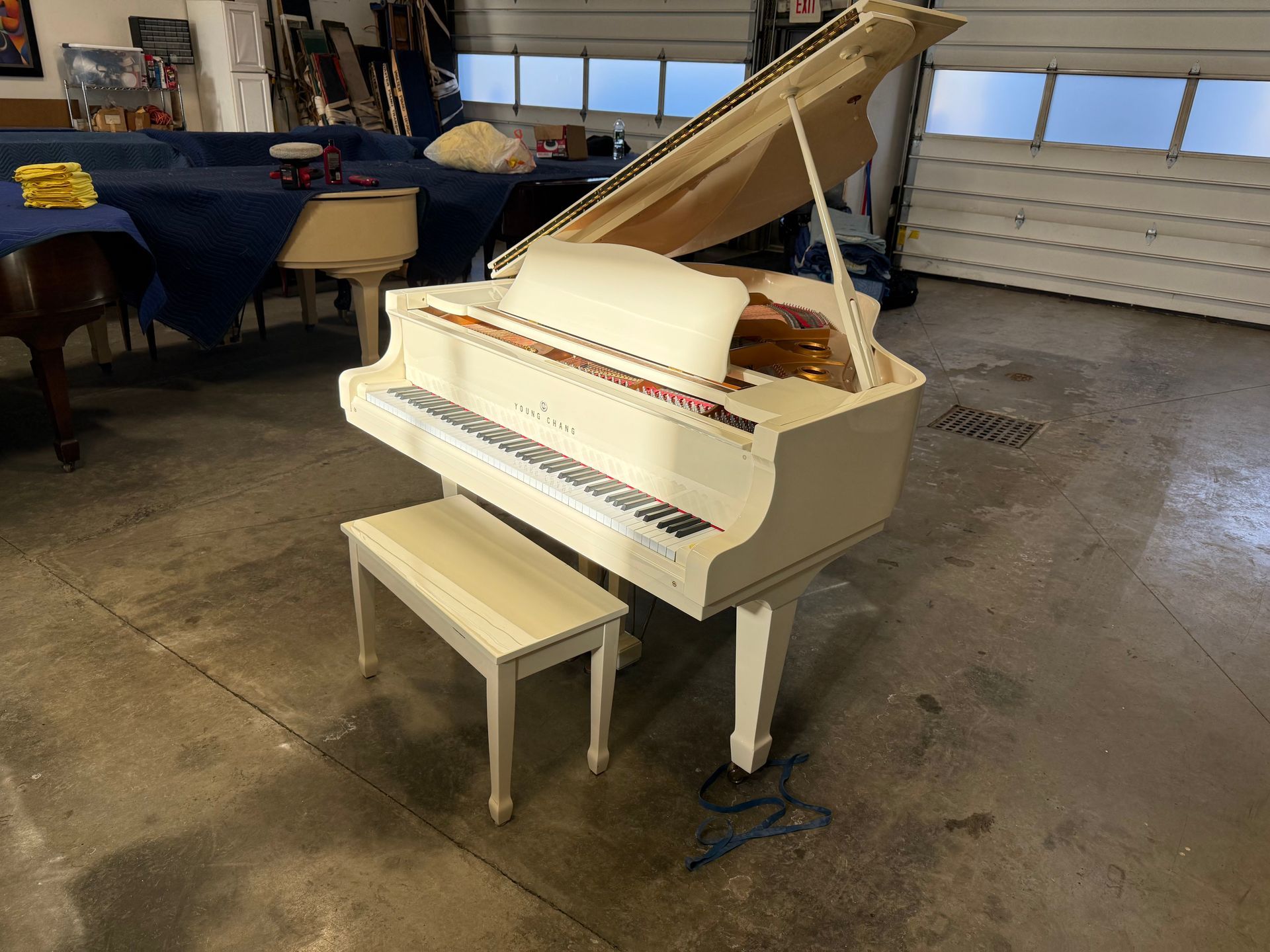 White young chang baby grand piano