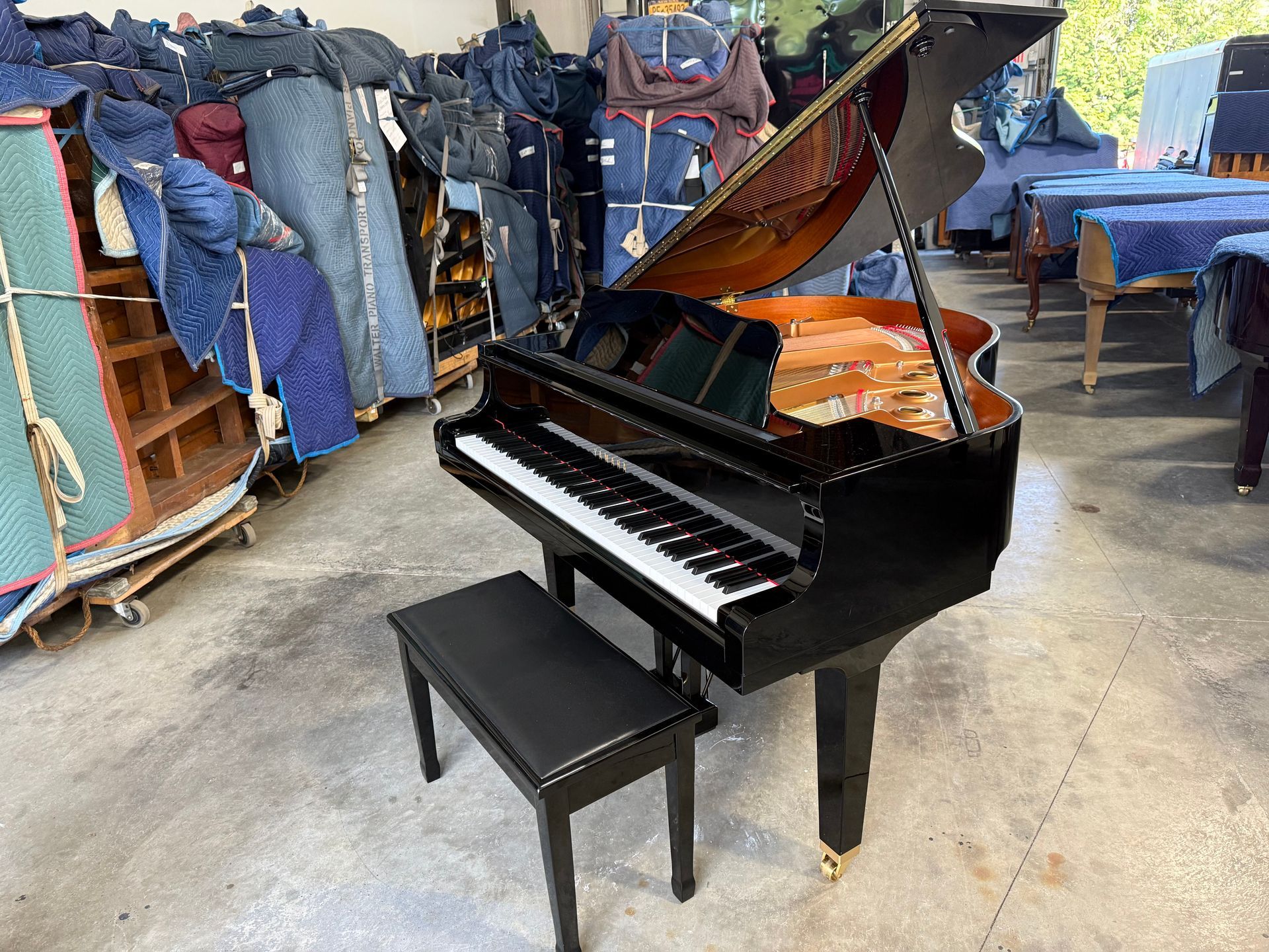 Black yamaha baby grand piano