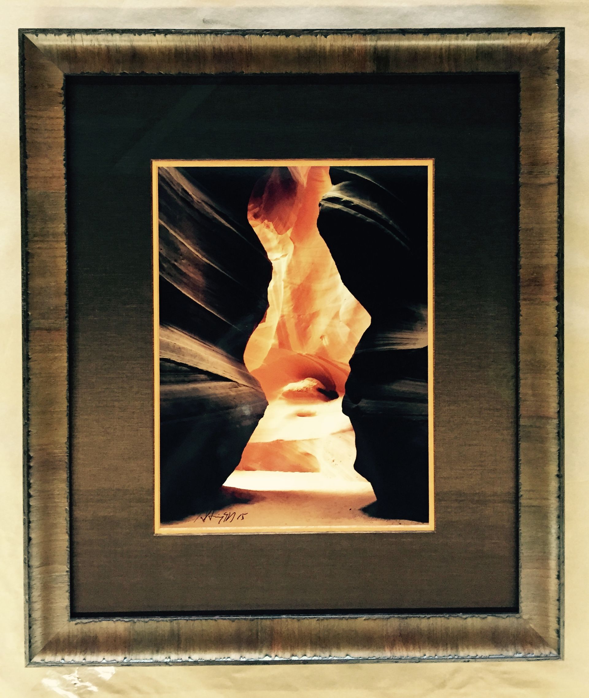 A picture of a canyon in a square frame