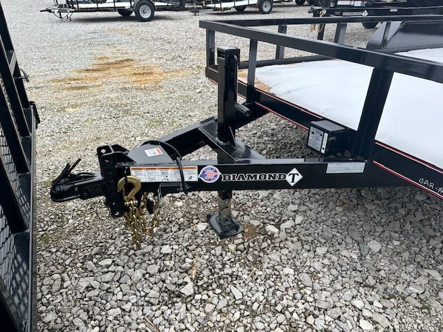Black Diamond C-channel trailer tongue with a trailer hitch, landing jack, and safety chains.
