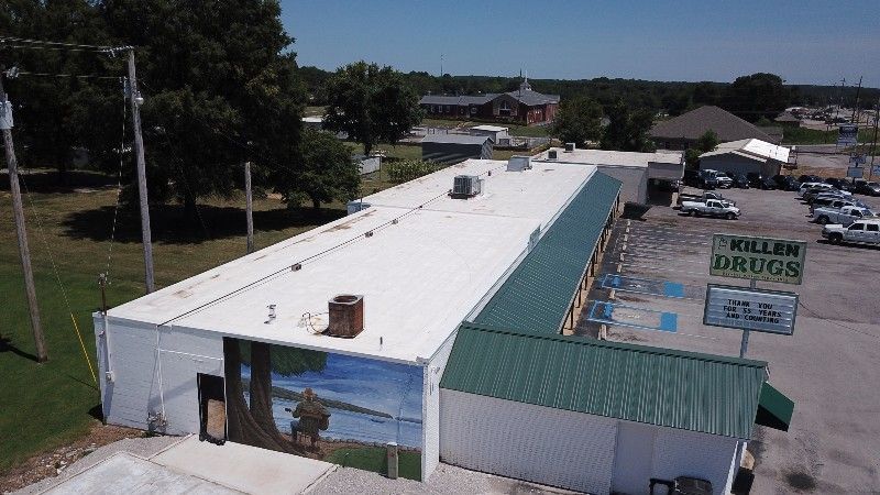 Building with PVC metal roofing
