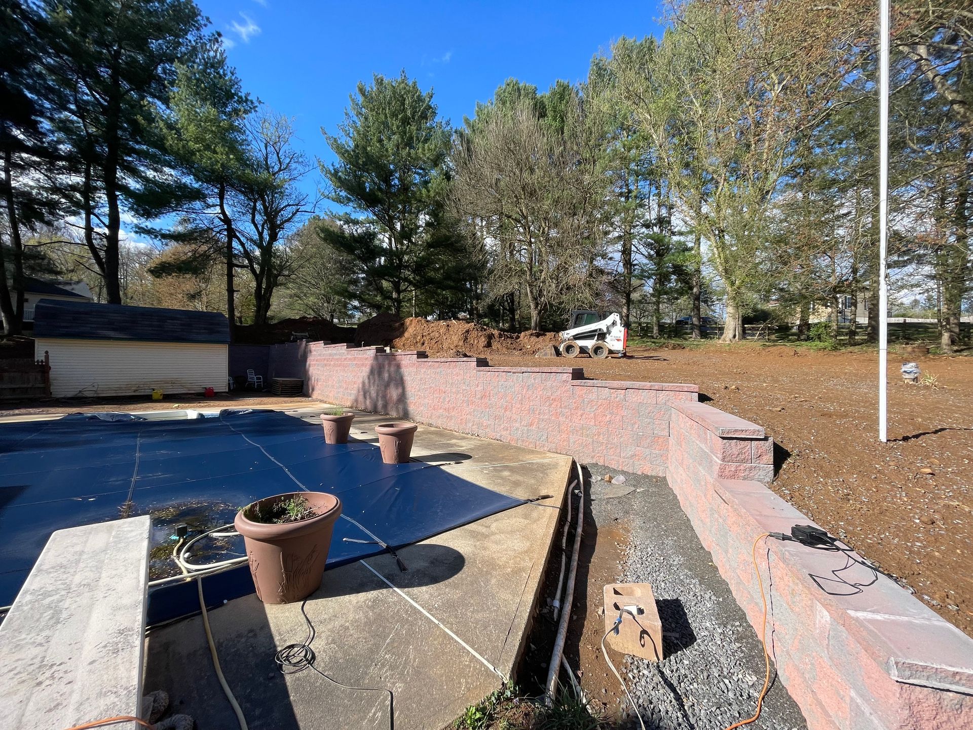 A large white house with a new walkway