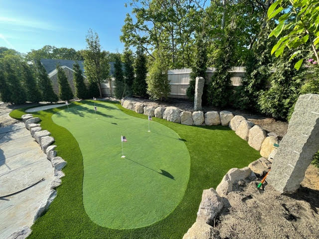 Green with rocks barrier