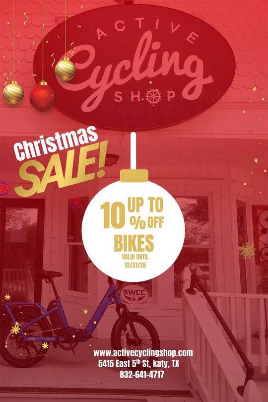 Active Cycling Shop Christmas Sale ad: 10% off bikes. Red and gold decorations, bike in front of the shop.