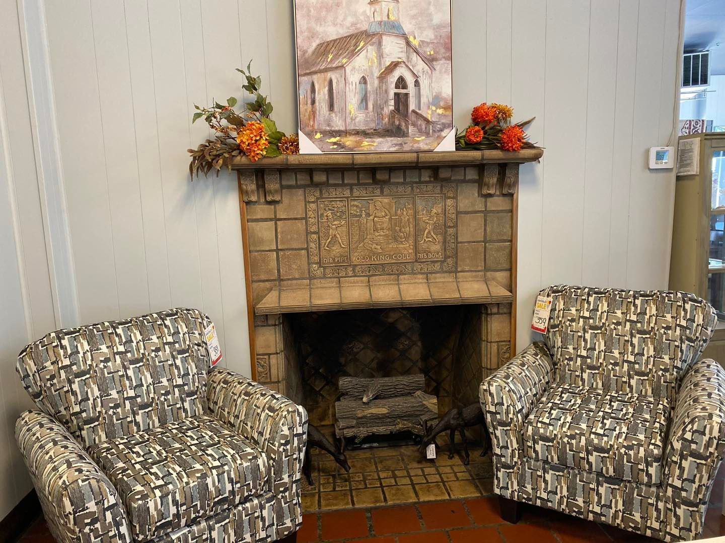 Painting on top of the fireplace