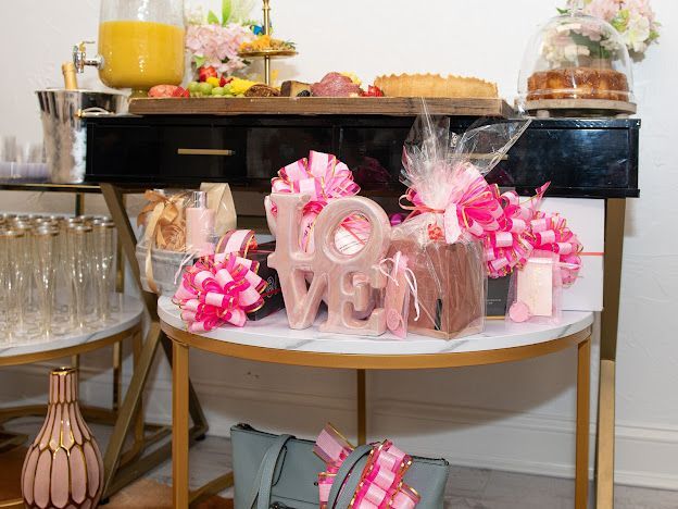 A table with a sign that says `` love '' on it.