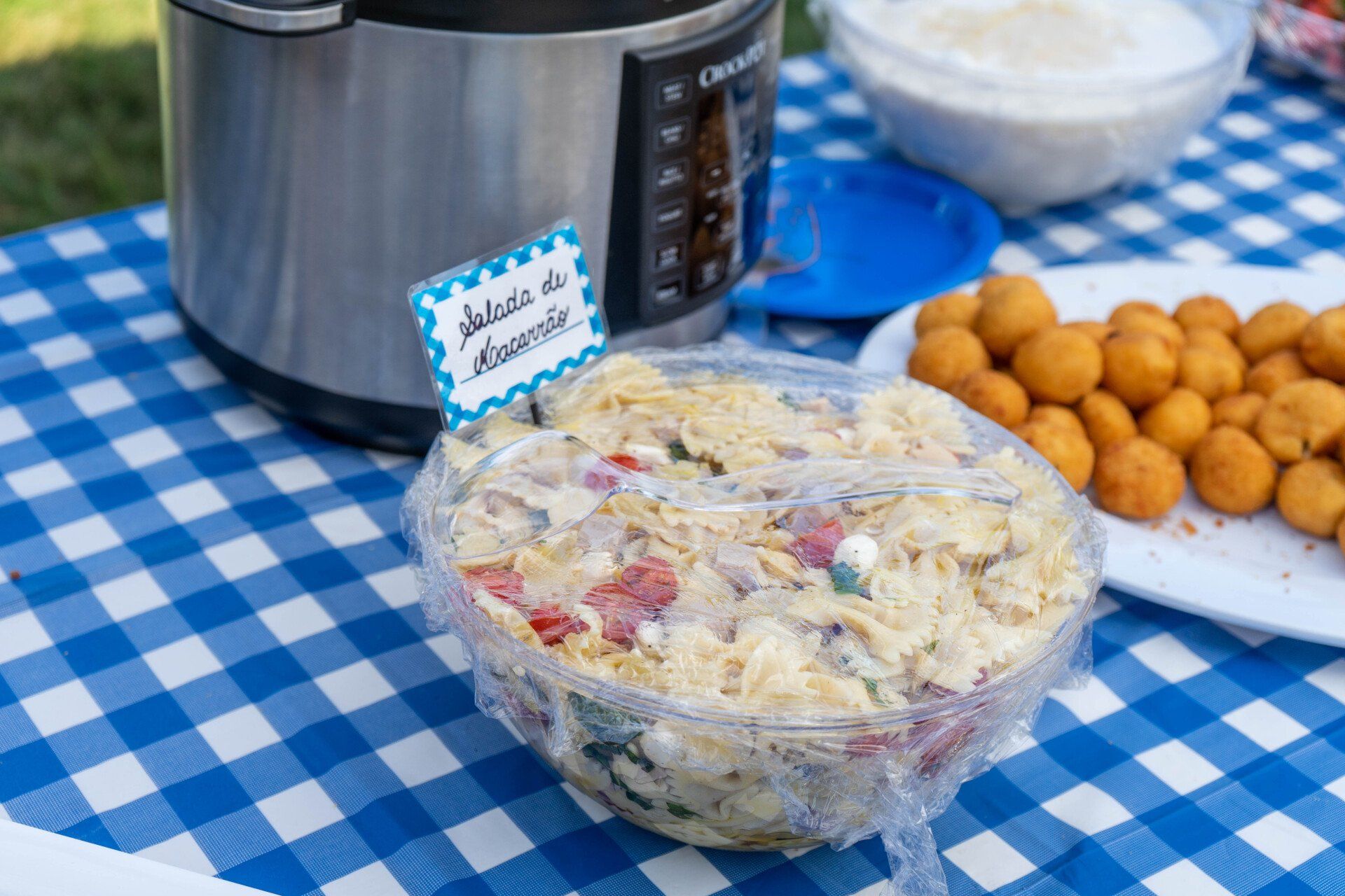 Pasta salad with sign