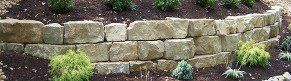 Ledge stone garden wall with landscaping