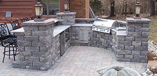 Paver patio with outdoor kitchen