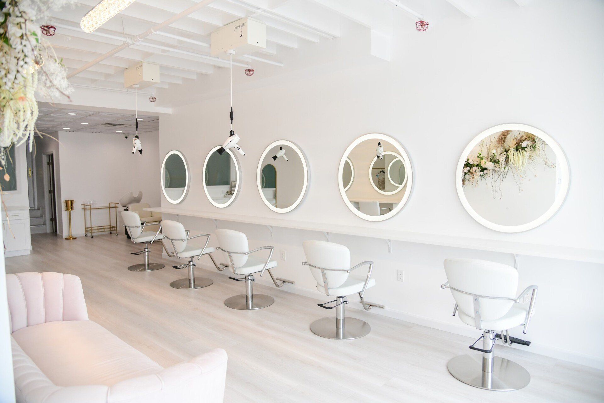 room with mirrors and chairs