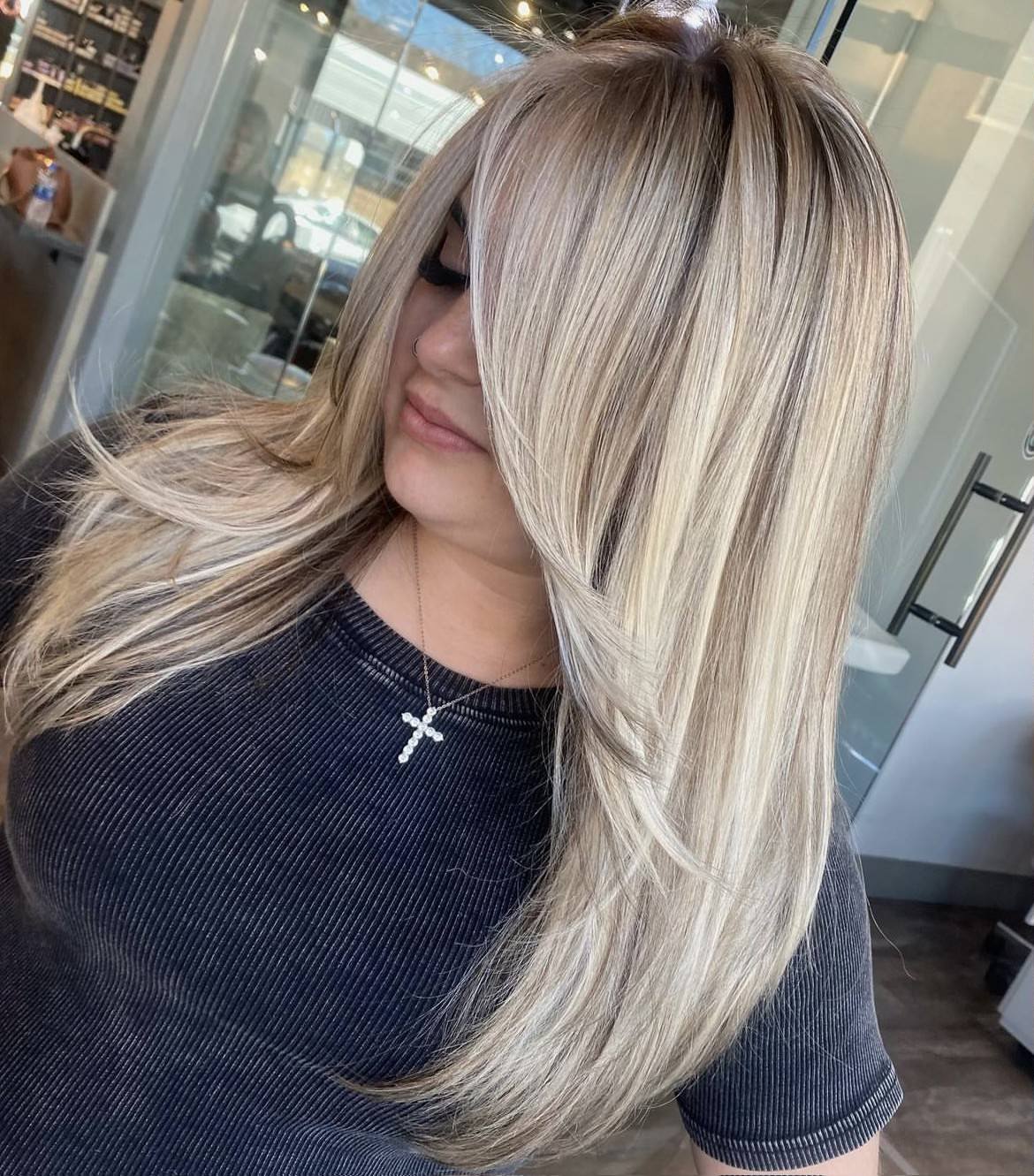 Woman with long bangs and blonde hair